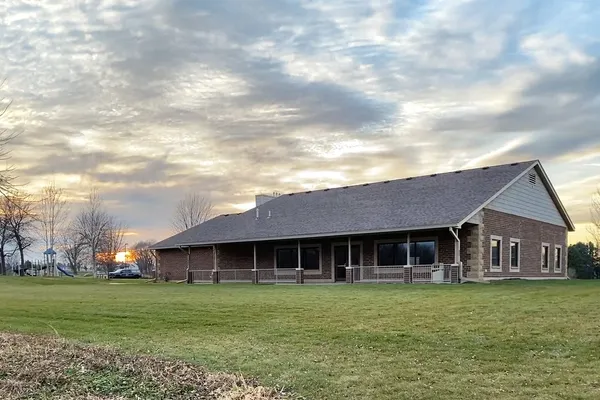 Outside view of the Spring lake Township Hall during the summer